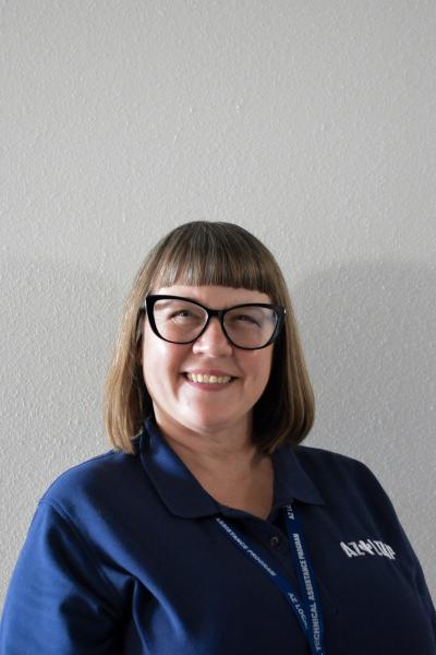 A headshot of the program manager, Rebecca Mayher